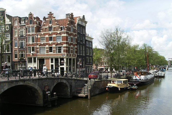 1,5 hours Amsterdam Rickshaw Tour - Rembrandtplein: The Square, the Statue, and City Life Noise