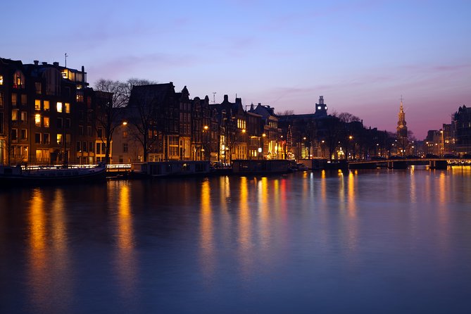 1-Hour Amsterdam Evening Canal Cruise - Night landmarks you may see, and where expectations can differ