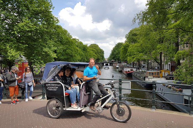 2.5 hours Amsterdam Pedicab Tour - Hotel pickup and rickshaw comfort, plus the small-group limits