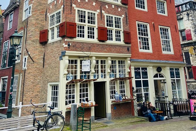 3 Course Walking Dinner in Delft with Guided Tours in Between - First guided walk: old town hall, water boards, and Prinsenhof