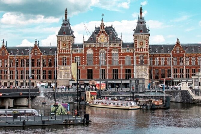 5 hrs Golden Age Amsterdam Private Walking Tour With Local Guide - From Amsterdam Centraal to St. Nicholas Basilica: A Strong Opening