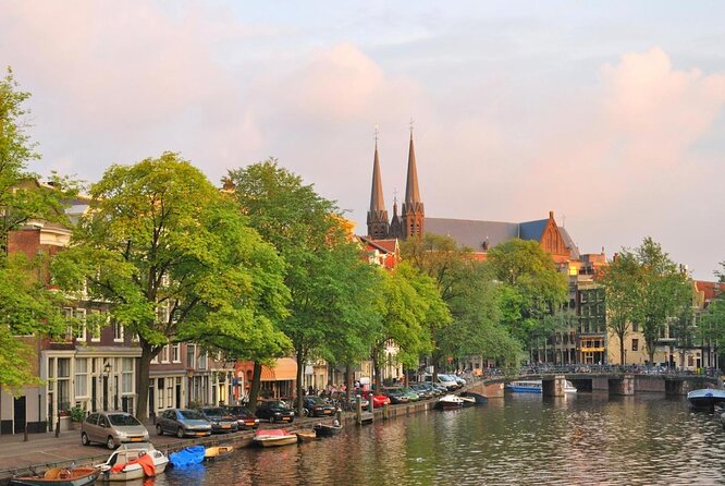 Amsterdam 1h Canal Cruise by Semi-Open Boat with Audio Guide - Quick Hits: What Makes This Canal Cruise Worth Your Time