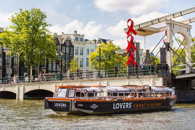 Amsterdam 1h Canal Cruise by Semi-Open Boat with Audio Guide - Entering at Lovers Canal Cruises Near Centraal Station
