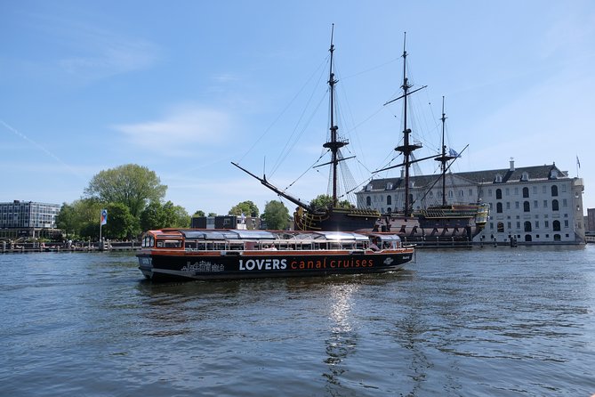 Amsterdam 1h Canal Cruise by Semi-Open Boat with Audio Guide - Crowd Levels, Weather, and Comfort: What Can Change Your Experience