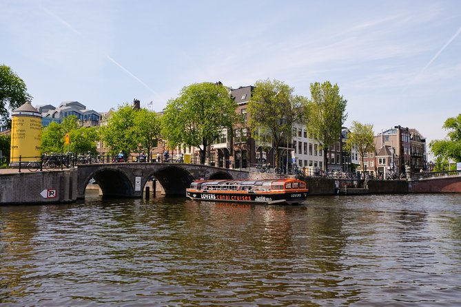 Amsterdam 1h Canal Cruise by Semi-Open Boat with Audio Guide - Value for $21.03: When This Is a Smart Buy
