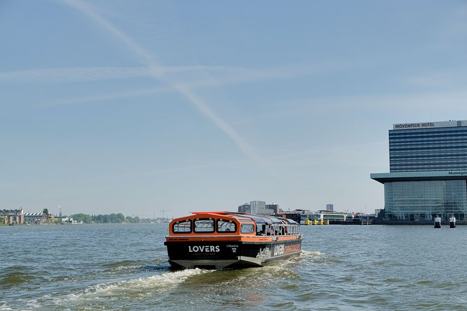 Amsterdam 1h Canal Cruise by Semi-Open Boat with Audio Guide - Who This Cruise Suits Best, and Who Might Skip It