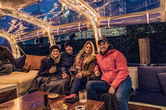 Amsterdam 2-Hour Evening Cruise With Live Guide and Bar - Churches, the Amstel River, and the beer connection