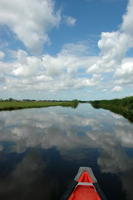 Amsterdam 5-Hour Guided Canoe Trip in the Wetlands - The return route: windmills, a drink, and a slower finish
