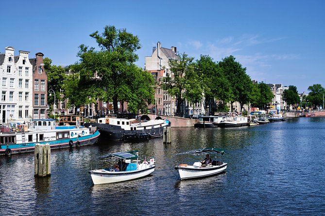 Amsterdam: 60-Minute Guided Private Canal Cruise with Drinks - Westerkerk and Rembrandt’s 1669 connection, seen from a distance you can appreciate