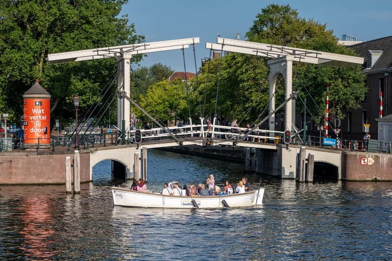 Amsterdam: 75 minute Open Boat Canal Cruise with Live Guide - Neighborhood Highlights You Will Actually Notice From the Water