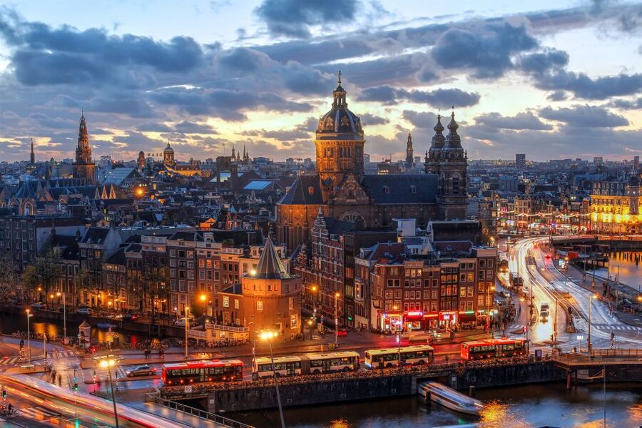 Amsterdam: After Dark Red Light District Tour - Oude Kerk first, because you need an anchor before the lights