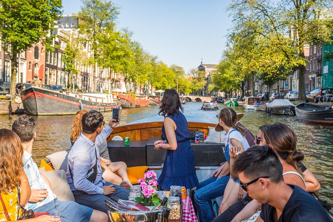 Amsterdam All-Inclusive 90-Minutes Heated Cruise by Captain Jack - Bridges, theaters, and river landmarks on the Amstel side