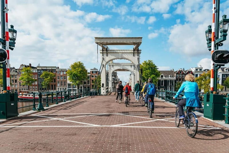 Amsterdam: Bike Tour with Optional Cruise in Small-Group - Bikeisready setup, helmets, and how small-group riding feels