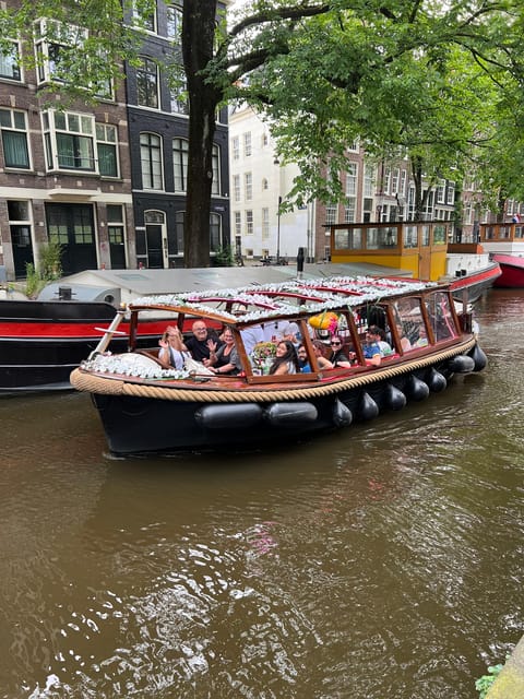 Amsterdam: Boat Tour with Optional Unlimited Drinks - Your Night Route: From the Red Light District to the Amstel