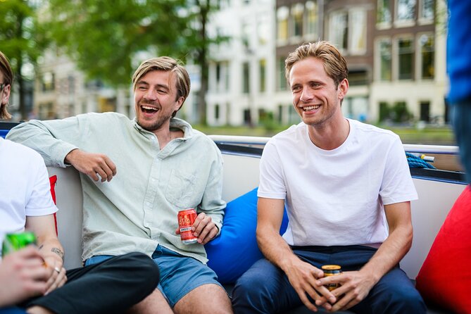 Amsterdam: Canal Booze Cruise with Unlimited Drinks Option - Entering the Cruise Route: Amstel River and the Famous Skinny Bridge