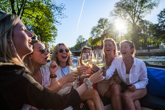 Amsterdam: Canal Booze Cruise with Unlimited Drinks Option - Red Light District at Water Level: What You See and How It Works