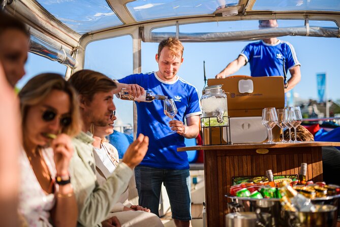 Amsterdam: Canal Booze Cruise with Unlimited Drinks Option - Weather and Comfort: Covered Boats Help, But Plan for Wet Moments