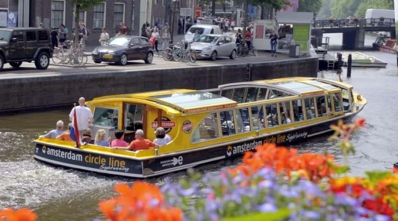 Amsterdam: Canal Cruise from Anne Frank Museum - The boat setup: heated shelter, toilet, and the best place to sit