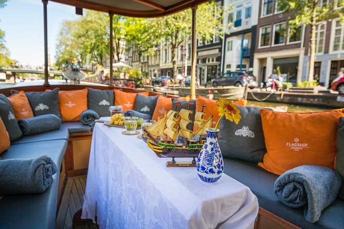 Amsterdam Canal Cruise in Classic Salon Boat With Drinks and Cheese - Getting started smoothly: orange guides, Leliegracht 50, and the step aboard