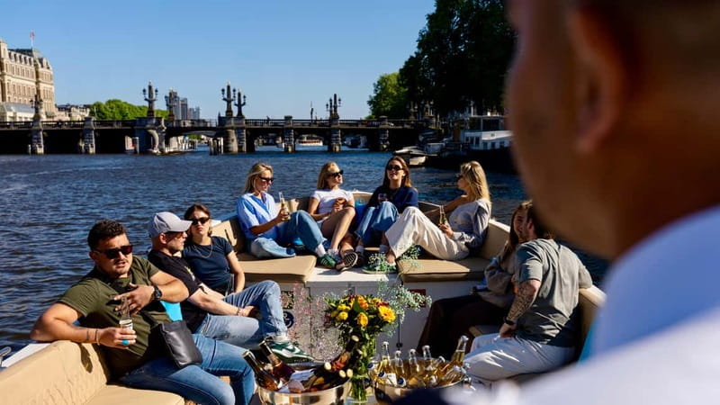 Amsterdam: Canal Cruise in Open Boat with Drink Option - One Hour on an Open Electric Boat Through Amsterdam’s Canal Belt