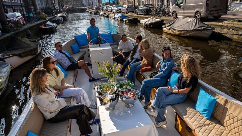 Amsterdam: Canal Cruise in Open Boat with Drink Option - Stop by Stop: Westerkerk to Het Grachtenhuis