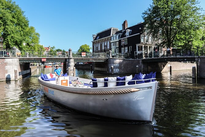 Amsterdam Canal Cruise in Open Boat with Unlimited Drinks Option - Glass-Topped Viewing and the Open-Boat Reality Check