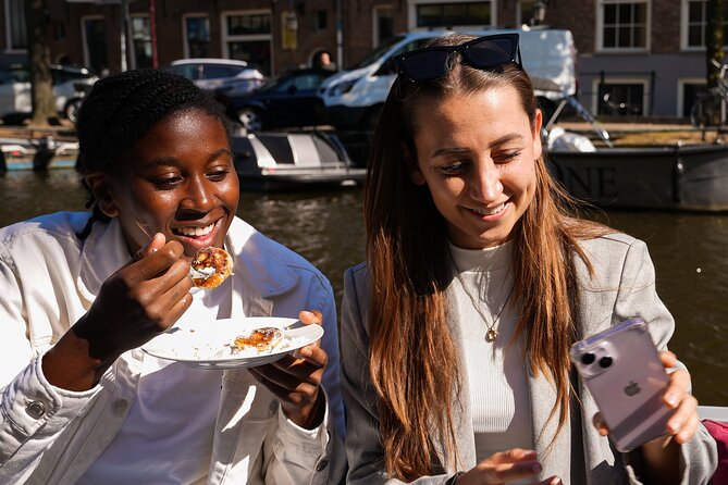 Amsterdam Canal Cruise with Dutch Pancakes and Drinks - Neighborhood Mix: Working-Class Streets to Jordaan Shopping Edges