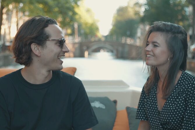 Amsterdam Canal Cruise with German Guide and unlimited drinks - Photos, timing, and how to get the best views from your seat