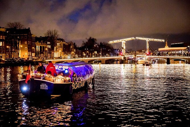 Amsterdam Canal Cruise With Live Guide and Unlimited Drinks - Finding the boat at Amstel 51F, then getting on fast