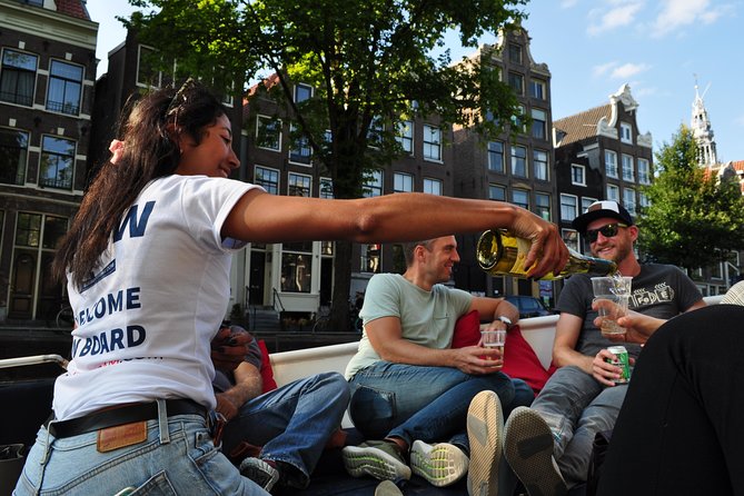 Amsterdam Canal Cruise With Live Guide and Unlimited Drinks - 100% electric boats, open-air views, and winter-heated comfort