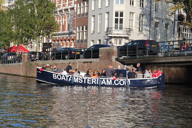 Amsterdam Canal Cruise with Open Bar - Central Station - Comfort and photo tips, open boat realities in Amsterdam