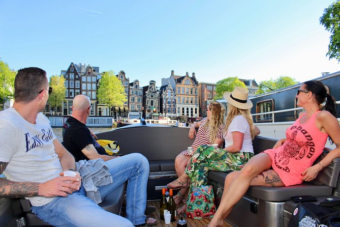 Amsterdam Canal Tour by Open Boat – 90 min Small Group Experience - Meeting point and what the 90 minutes really covers