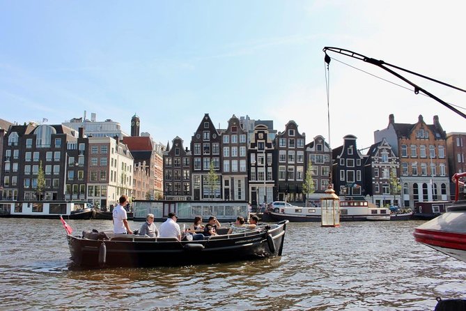 Amsterdam Canal Tour by Open Boat – 90 min Small Group Experience - Comfort, rain gear, and drinks: what to plan for onboard