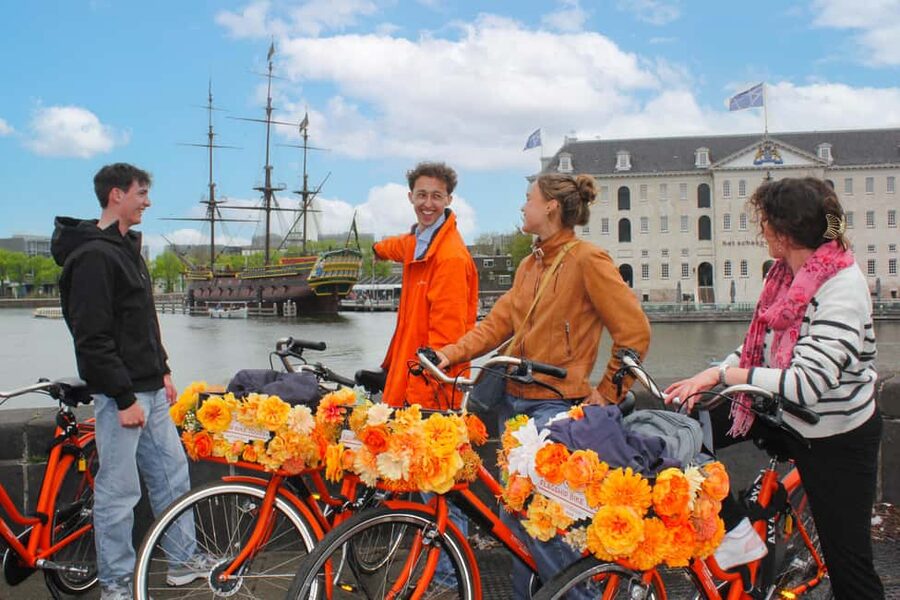 Amsterdam: Cheese, Windmill & Countryside Bike Tour - Leaving Amsterdam for North Holland, with a ferry to reset your eyes