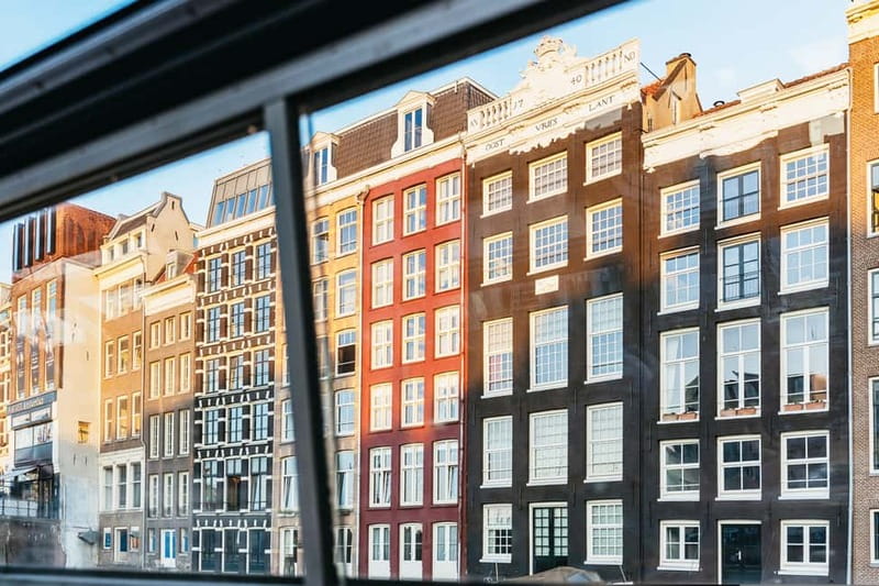 Amsterdam: Cheese & Wine Cruise Tasting Experience - The route at night: Canal Belt highlights you can spot in real time