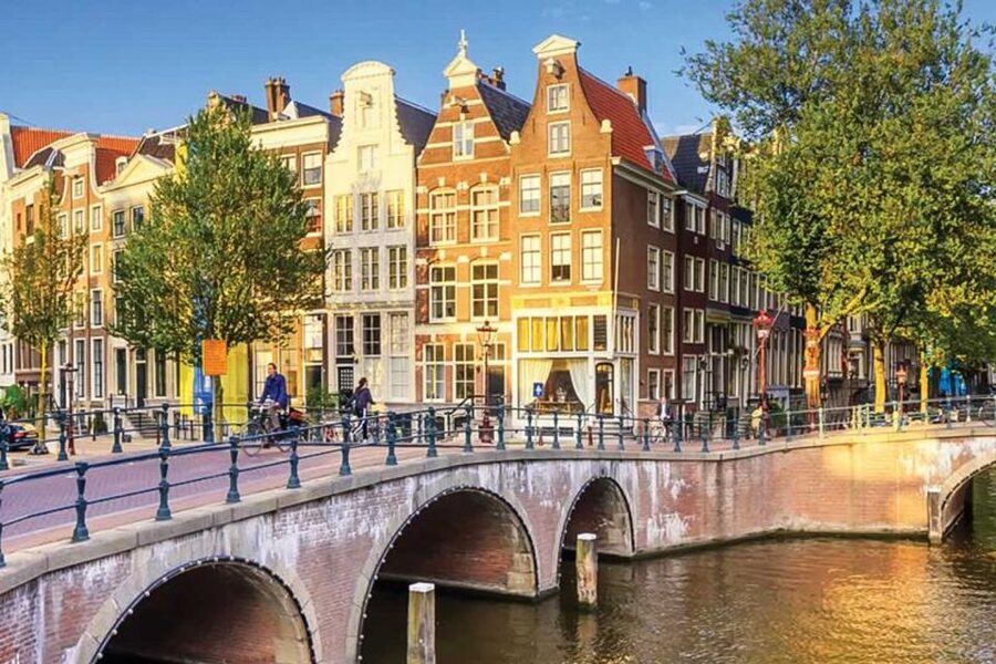 Amsterdam City Center Guided Walking Tour - 12 guests 2,5h - The route start: St Nicholas Church meeting point and nearby beginnings