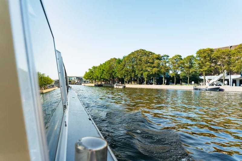 Amsterdam: City Centre Canal Cruise & Free Flower Cocktail - The Audio Guide: Multi-Language Stories Without the Headphone Hassle