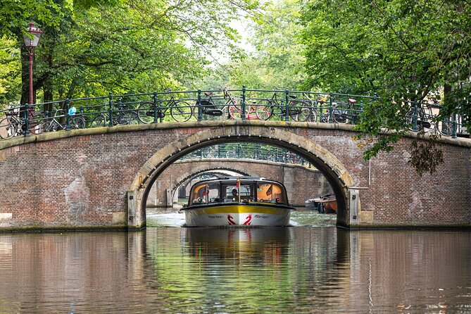 Amsterdam City Centre Cruise on heated boat with Audioguide - The Skinny Bridge stop: romantic look, classic canal geometry