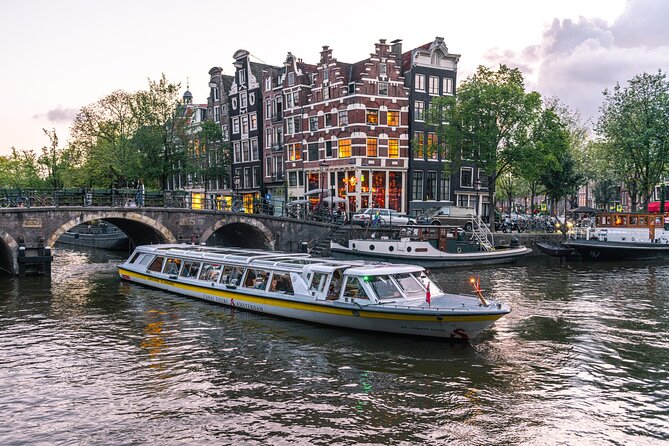 Amsterdam City Centre Cruise on heated boat with Audioguide - On-board perks that actually matter: Wi-Fi, restroom, and stroopwafel