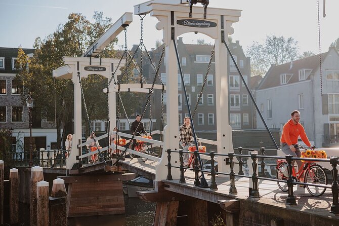 Amsterdam City Top Highlights Guided Bike Tour - A Quick Taste of Amsterdam’s Street Life and the Red Light District Edge