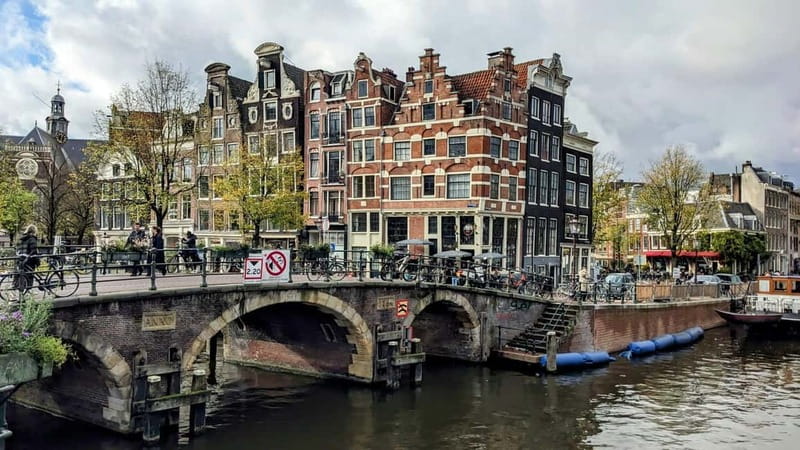 Amsterdam: City walking experience with a local - Dam Square: the big stage behind the Royal Palace views