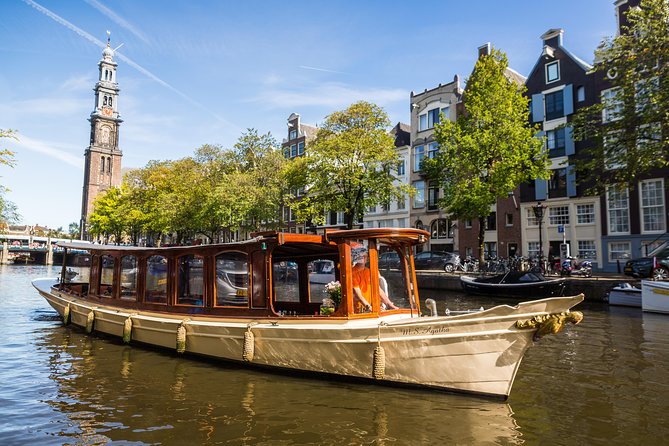 Amsterdam Classic Saloon Boat Cruise with Drinks and Cheese - A 1-hour canal reset on a covered saloon boat