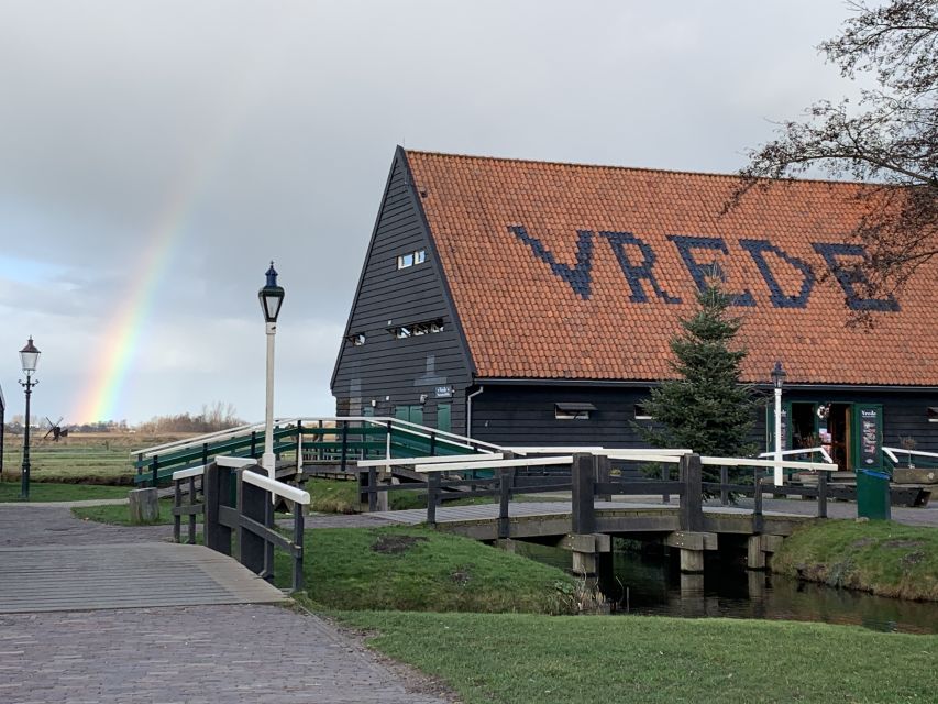 Amsterdam: Countryside Bike Tour and Zaanse Schans Windmills - Zaanse Schans: One Windmill Visit, plus Timed Dutch Traditions