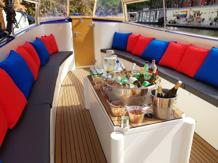 Amsterdam: Covered Canal Booze Cruise with Unlimited Drinks - The Crew Dynamic: Skipper Plus Host Makes It Feel Local