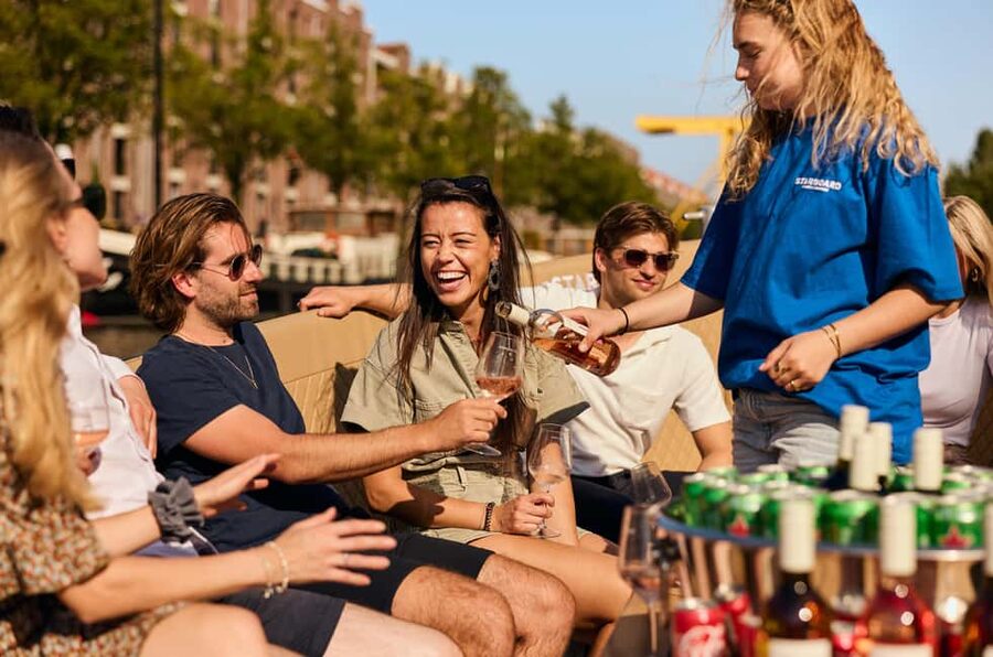 Amsterdam: Cozy Evening Canal Cruise With Open Bar Option - One hour on Amsterdam canals is the best shortcut to getting your bearings