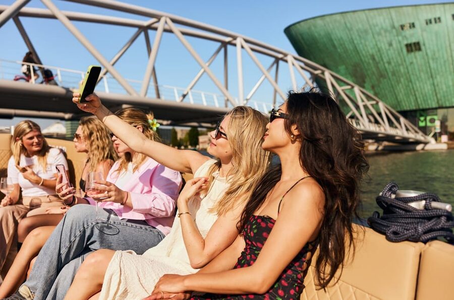 Amsterdam: Cozy Evening Canal Cruise With Open Bar Option - The Golden Age canal route, plus what the guide points out from the water