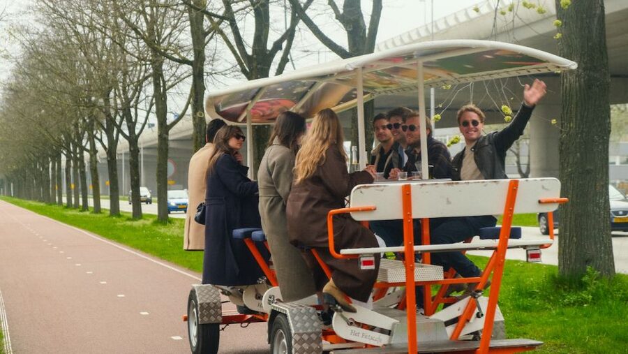 Amsterdam: Dutch Beer Bike Blast Tour with Onboard Bar - Coffeeshop Sloterdijk Stop: A Quick Stretch and Shopping Time