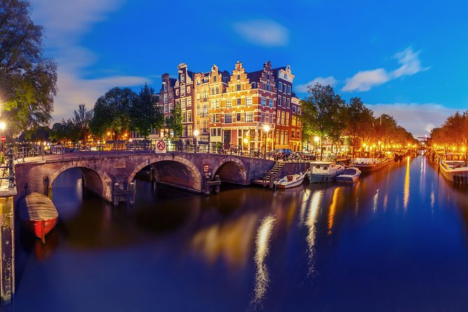 Amsterdam Evening Canal Cruise with Live Guide and Onboard Bar - Western Church to Anne Frank House, the emotional landmarks