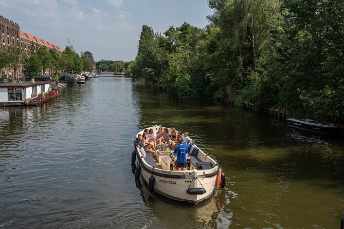 Amsterdam: Evening Candle Light Cruise With Wine & Cheese - Where you meet: Oudezijds Voorburgwal 230, then back where you started