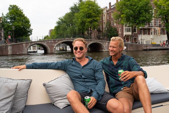 Amsterdam: Evening Candle Light Cruise With Wine & Cheese - Herengracht, Prinsengracht, and Magere Brug at night